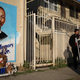 Activists look at a mural of Ezell Ford, a 25-year-old mentally ill black man, at the site where he was shot and killed by two police officers Aug. 11, 2014, in Los Angeles.
David McNew/Getty Images